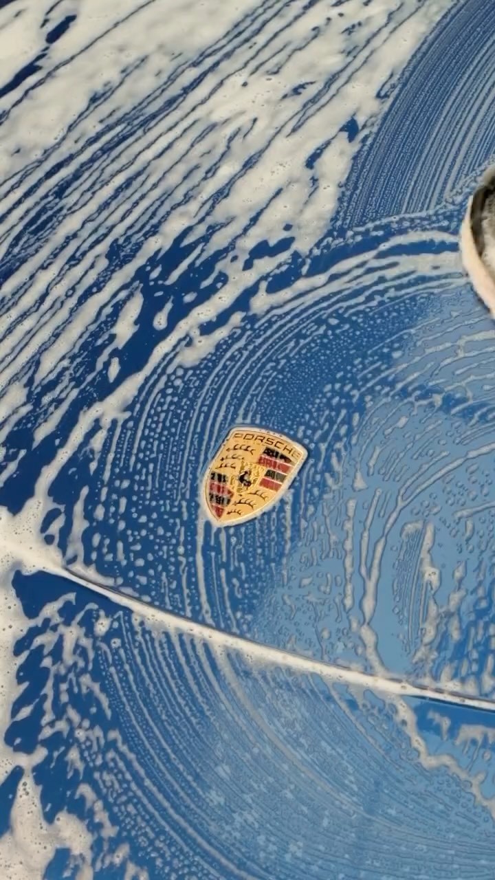 Porsche covered in foam